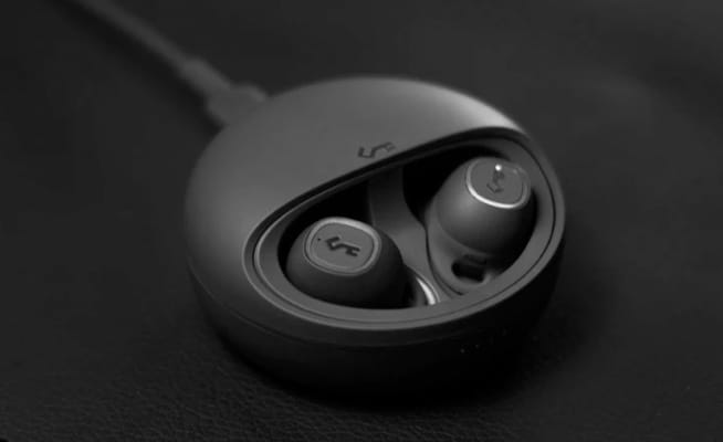 YX1 wireless earphones in their charging case
